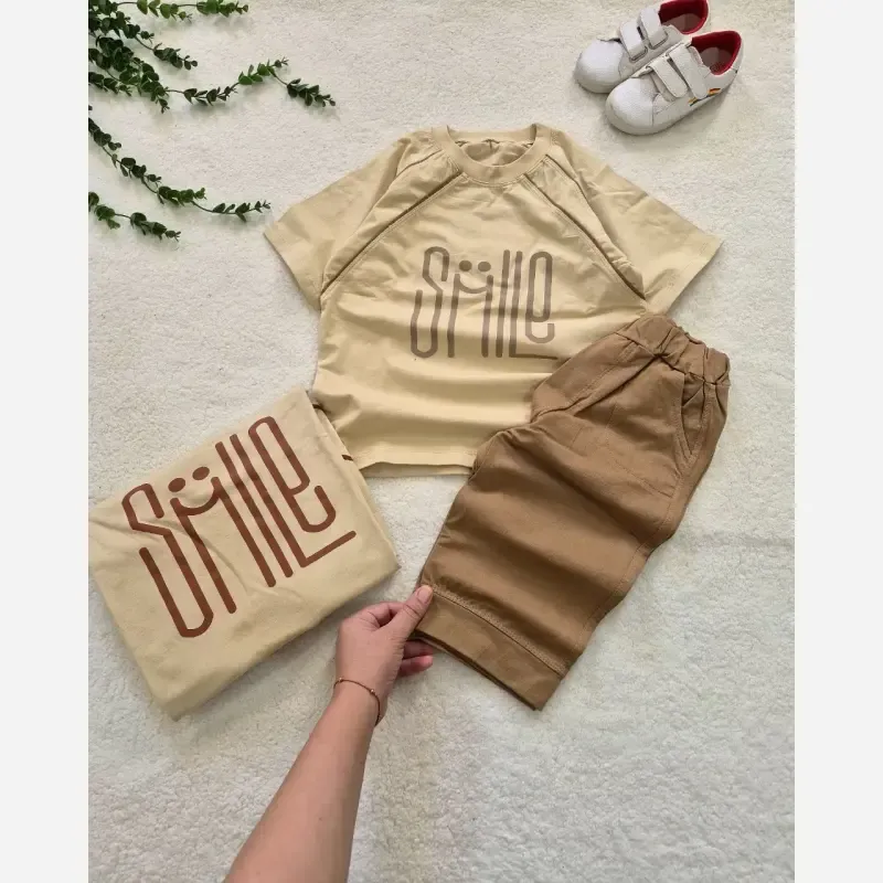 ست تیشرت و شلوارک بچگانه طرح SMILE جنس پنبه تیپ لاکرا سایز 50 تا 60 - تصویر 2