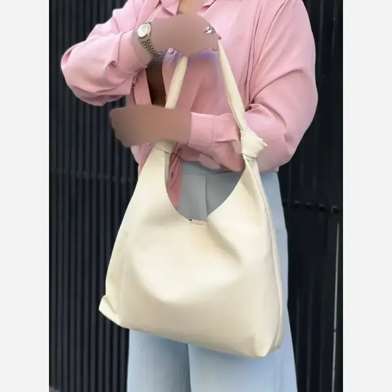 کیف زنانه شرانگ خارجی بند گره به همراه کیف آرایش سایز 33-38 - تصویر 5