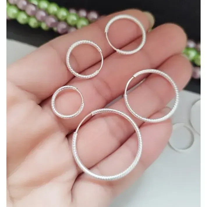 گوشواره نقره حلقه ای زنانه عیار 925 تراش دار - تصویر 5