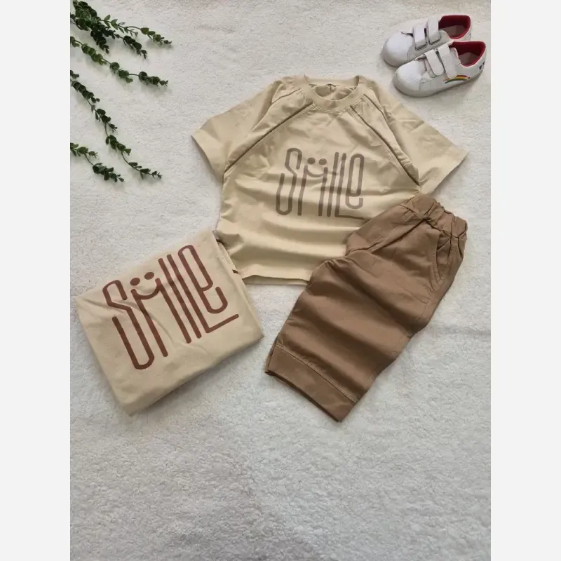 ست تیشرت و شلوارک بچگانه طرح SMILE جنس پنبه تیپ لاکرا سایز 50 تا 60 - تصویر 5
