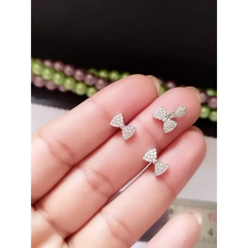 نیم ست نقره زنانه عیار 925 طرح پاپیون با روکش طلا سفید و گوشواره میخی وزن 2 گرم - تصویر 4