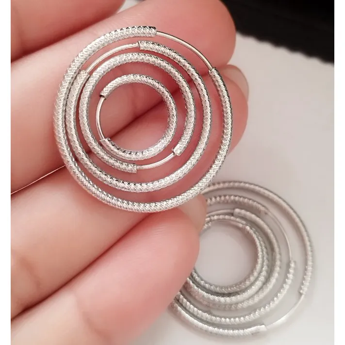 گوشواره نقره حلقه ای زنانه عیار 925 تراش دار - تصویر 12